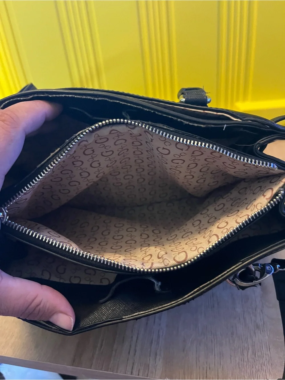 Guess Black Embossed Satchel Bag in good condition except missing one button